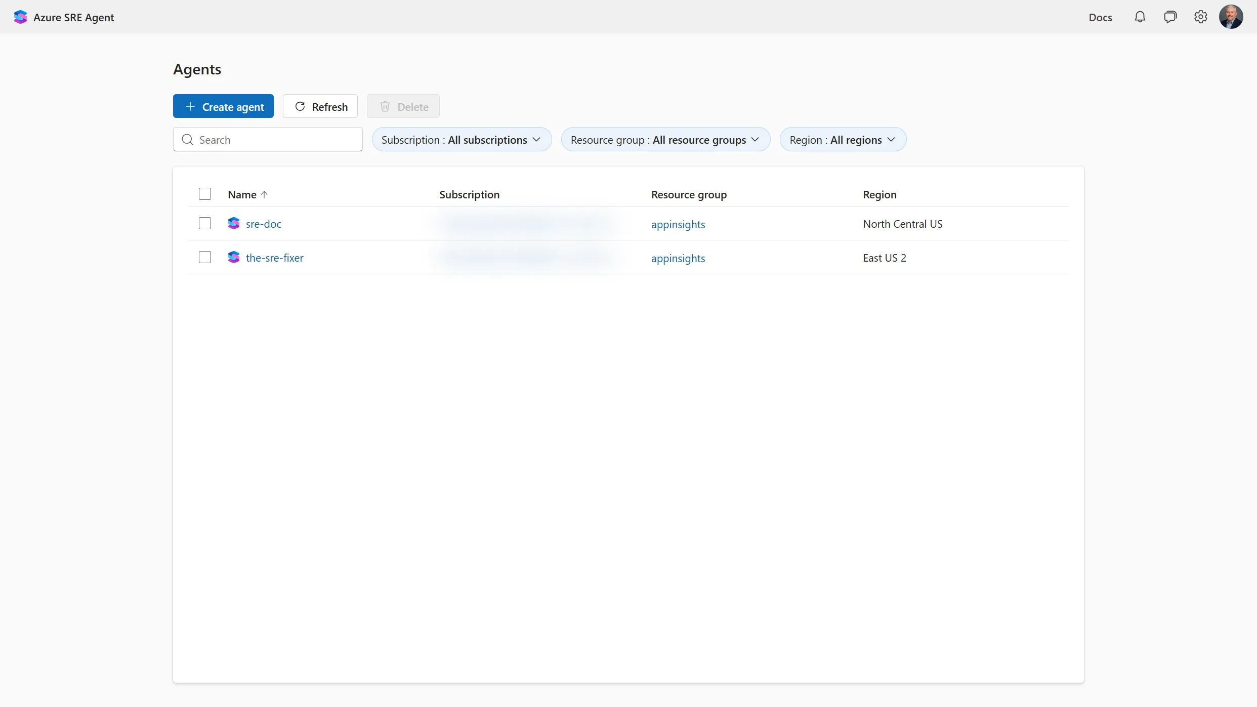 Azure SRE Agent portal agent list showing two agents named sre-doc and the-sre-fixer with their subscription blurred, resource group appinsights, and regions North Central US and East US 2, above a Create agent button